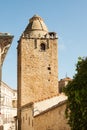 Alfiler tower, a 14th Century Gothic belfry adorned with glazed roof tiles and favourite nesting place for storks