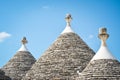 Trulli of Alberobello, Puglia, Italy: Typical houses built with dry stone walls and conical roofs. In a beautiful sunny day. Royalty Free Stock Photo