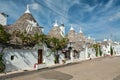 Trulli houses in the shopping street in Alberobello, Puglia, Italy