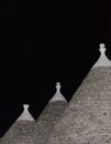 Trulli roofs in the night. Three trulli at cisternino in apulia Italy