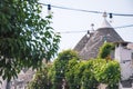 Trulli, traditional Apulian dry stone hut old houses with a conical roof in Alberobello Royalty Free Stock Photo