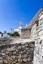 Trullo house and the local church from Alberobello village