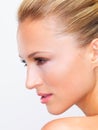 Truly astounding image of perfect beauty in profile. Closeup profile of a radiantly beautiful woman looking away