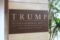 Trump Interntional Hotel Waikiki Beach Walk entrance sign. The luxury hotel will change to Hilton resorts in 2024. Royalty Free Stock Photo