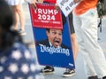 Trump Supporter Holding Signs Against Florida Republican Governor Ron Desantis