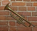 Trumpet on brick wall background Royalty Free Stock Photo