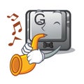 With trumpet button G in the character shape Royalty Free Stock Photo