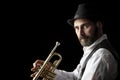 Trumpet man with beard portrait on black Royalty Free Stock Photo