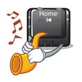 With trumpet mascot toy home button attached computer Royalty Free Stock Photo
