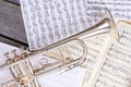 Trumpet on musical notes close up. Royalty Free Stock Photo