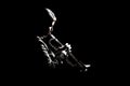 Jazz trumpet player playing brass instruments