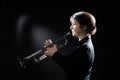 Trumpet player. Woman trumpeter