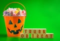 A Trunk or Treat SIgn and a Bucket FIlled with Candy Royalty Free Stock Photo