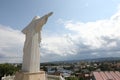 Truskavets, Ukraine - July 22, 2023: Statue of Christ the Redeemer against beautiful cityscape
