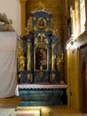 Truskolasy, Poland, July 9, 2022: Sanctuary of Our Lady of Grace in Truskolasy. The largest larch church in Poland. Side altar