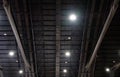 The truss metal frame with the electric bulb system on the ceiling Royalty Free Stock Photo