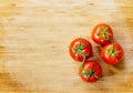 Truss Tomatoes On Wooden Background