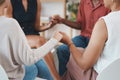 Trust, community and group of people holding hands in therapy counseling session for mental health. Empathy, diversity Royalty Free Stock Photo