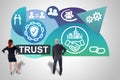 Trust concept watched by business people Royalty Free Stock Photo