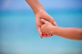 Trust family hands of child girl and mother on