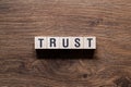 Trust - word concept on building blocks, text Royalty Free Stock Photo