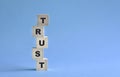 Trust word written on wooden blocks stacking up Royalty Free Stock Photo