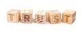 Trust written on wooden blocks