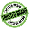 TRUSTED BRAND text written on green-black round stamp sign