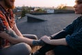 Trustful relationships. Romantic date on roof