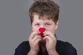 Truth - boy with red clown nose