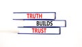 Truth builds trust symbol. Concept words Truth builds trust on books on a beautiful white table white background. Business truth Royalty Free Stock Photo