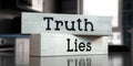 Truth, lies - words on wooden blocks
