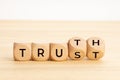 Truth or trust concept. Text on wooden blocks