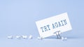 Try Again - concept of text on business card. Work and study concept Royalty Free Stock Photo