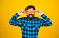 Try on a new style. funny and joyful man wear checkered shirt. just having fun. happy brutal party goer. mature bearded