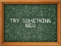 Try Something New - Hand Drawn on Green Chalkboard.