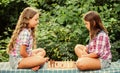 Try to beat me. chess playing sisters. skilled children. turn on your brain. make brain work. early childhood