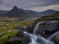 Tryfan in spring with the Afon Lloer in flow over the waterfalls, Wales