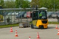 Training employees to operate a forklift on an equipped site.