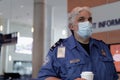 TSA Agent Watching Over Travelers