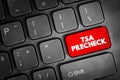 TSA Precheck text on computer keyboard key illustrating airport security program, traveler screening access, expedited clearance, Royalty Free Stock Photo