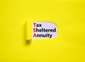 TSA, tax sheltered annuary symbol. Concept words TSA, tax sheltered annuary on white paper. Beautiful yellow background, copy