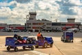 TSA workers transporting baggage