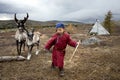 Tsaatan kid in a taiga of northern Mongolia