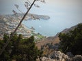 Tsambika beach is long and broad with fine, golden sand and dozens of colourful little flags the most beautiful beaches on Rhodes