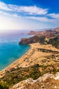 Tsampika beach with golden sand view from above, Rhodes, Greece. Aerial birds eye view of famous beach of Tsampika, Rhodes island Royalty Free Stock Photo