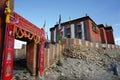 Gate with a prayer at the entrance to Tsarang Gompa - a monastery of the Sakya sect, built in 1395. Trekking to the Upper Mustang