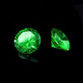 Tsavorite Garnet on a black background