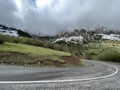 Tseylomsky pass in Ingushetia. A trip uphill to the Tsei Loam pass on a cloudy spring day. Panorama of the high cliffs