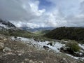 Tseylomsky pass in Ingushetia. A trip uphill to the Tsei Loam pass on a cloudy spring day. Panorama of the high cliffs